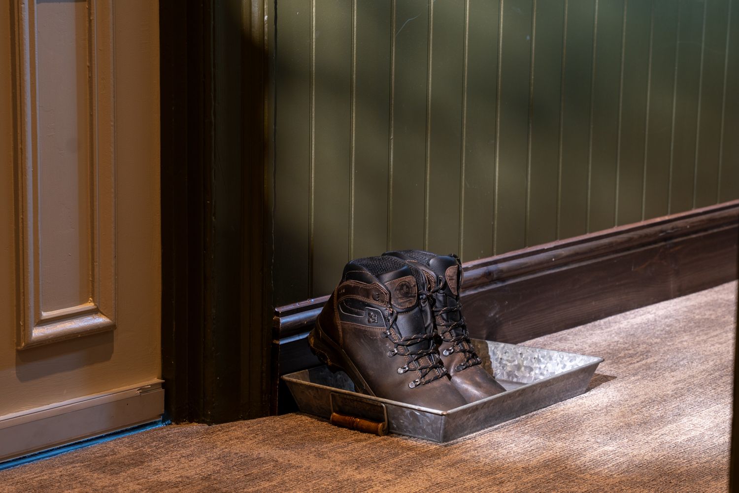 boot tray by the bedroom door