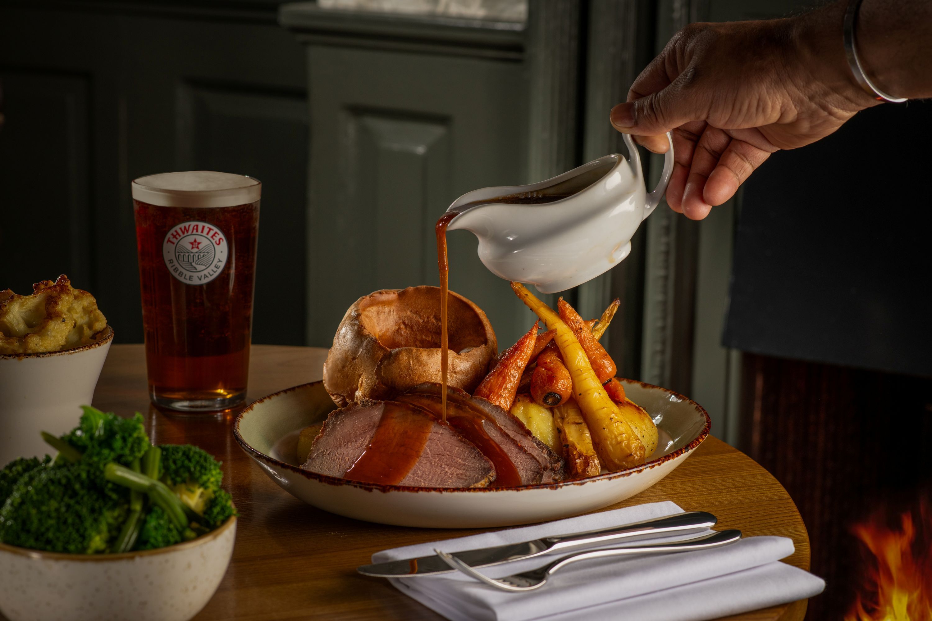 roast dinner with all the trimmings and a thwaites ale